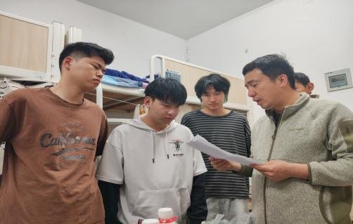 实行包楼到人